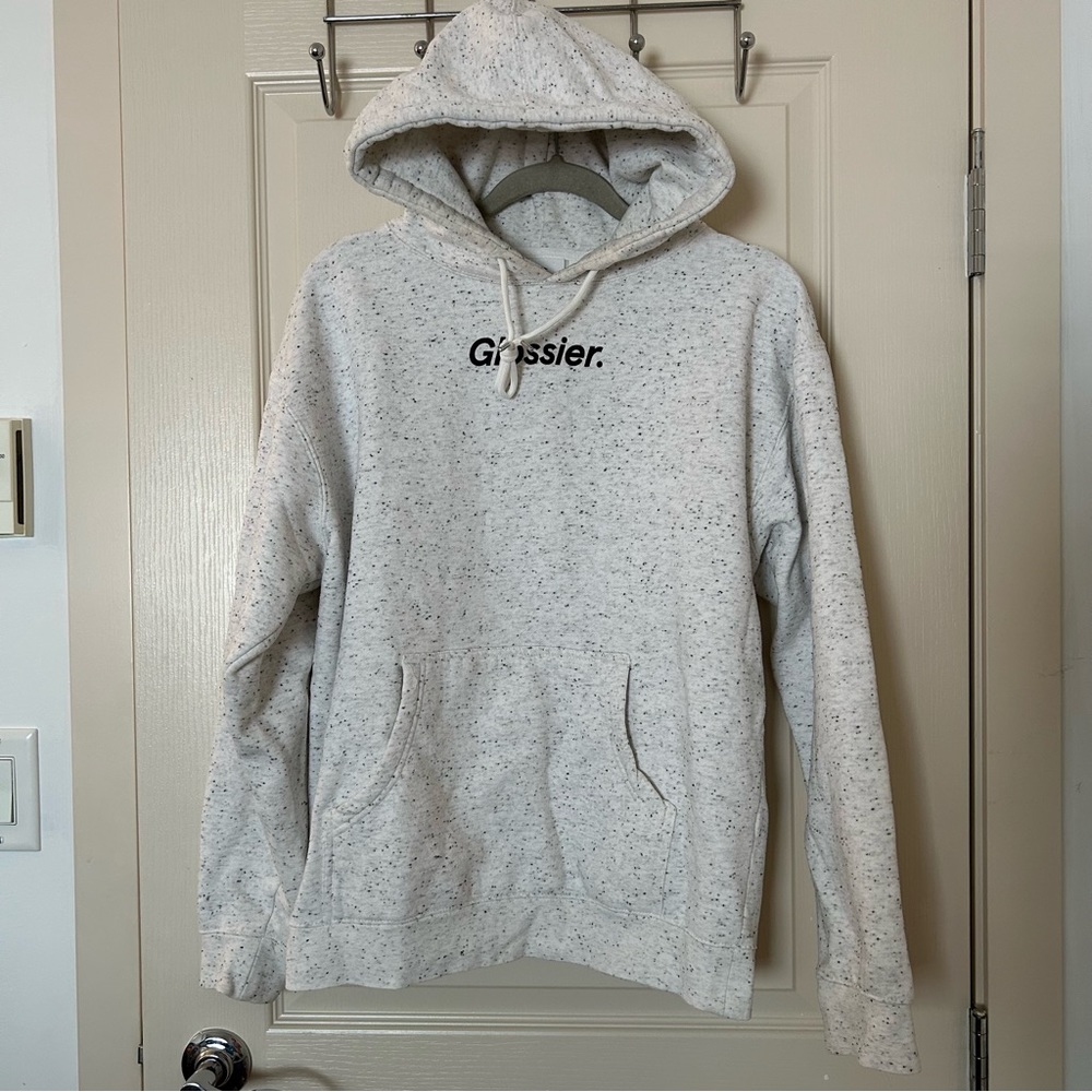 White speckled Glossier hoodie in Terrazzo colour